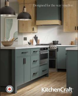 neutral kitchen with white and wooden cabinetry surrounding grey slab island